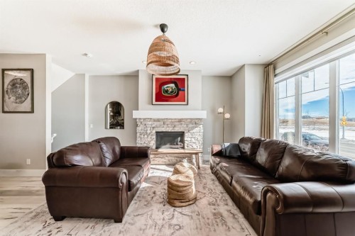 68 Mahogany Gardens Se, Calgary, AB - Indoor Photo Showing Living Room With Fireplace