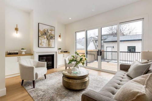 631 28 Avenue Nw, Calgary, AB - Indoor Photo Showing Living Room With Fireplace