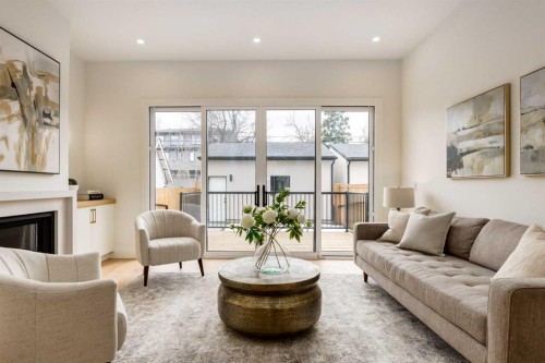 631 28 Avenue Nw, Calgary, AB - Indoor Photo Showing Living Room With Fireplace