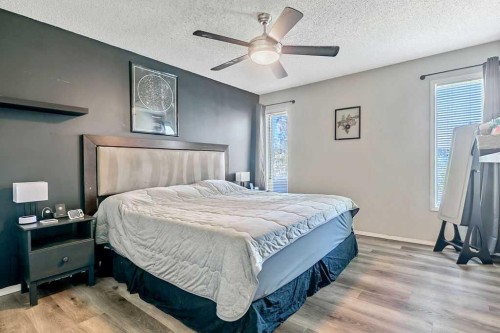 52 Hunters Crescent, Okotoks, AB - Indoor Photo Showing Bedroom