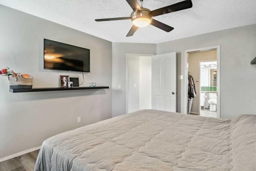 52 Hunters Crescent, Okotoks, AB - Indoor Photo Showing Bedroom