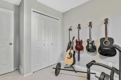 52 Hunters Crescent, Okotoks, AB - Indoor Photo Showing Other Room