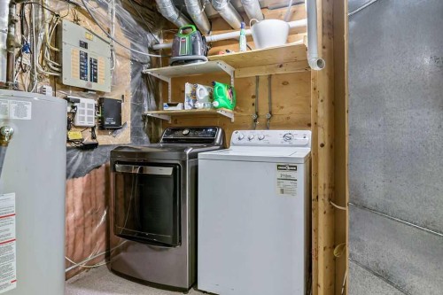 52 Hunters Crescent, Okotoks, AB - Indoor Photo Showing Laundry Room