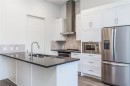109-12 Mahogany Path Se, Calgary, AB  - Indoor Photo Showing Kitchen With Stainless Steel Kitchen With Double Sink With Upgraded Kitchen 