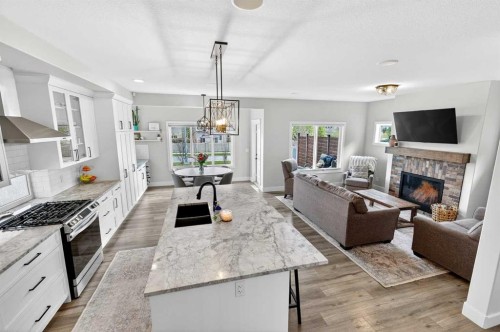 652 Reynolds Crescent Sw, Airdrie, AB - Indoor With Fireplace