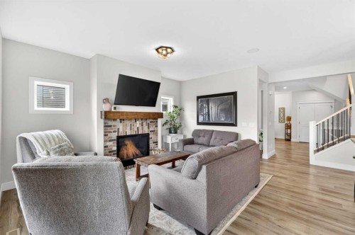 652 Reynolds Crescent Sw, Airdrie, AB - Indoor Photo Showing Living Room With Fireplace