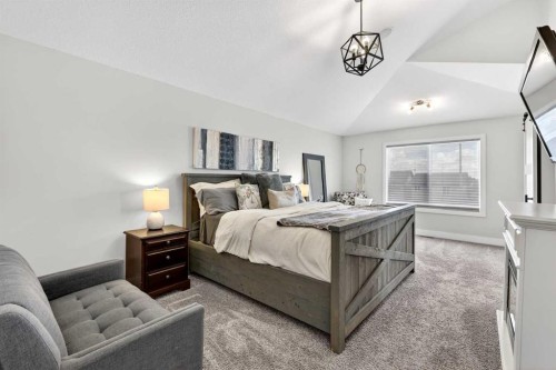 652 Reynolds Crescent Sw, Airdrie, AB - Indoor Photo Showing Bedroom