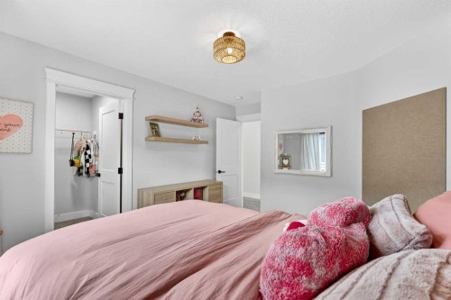 652 Reynolds Crescent Sw, Airdrie, AB - Indoor Photo Showing Bedroom