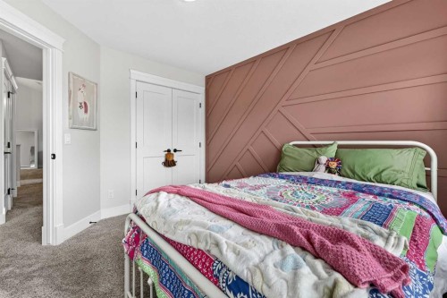 652 Reynolds Crescent Sw, Airdrie, AB - Indoor Photo Showing Bedroom
