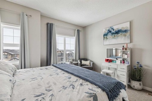 1009-250 Fireside View, Cochrane, AB - Indoor Photo Showing Bedroom