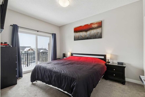 1009-250 Fireside View, Cochrane, AB - Indoor Photo Showing Bedroom