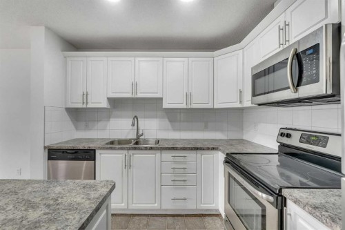 88 Cityscape Row Ne, Calgary, AB - Indoor Photo Showing Kitchen With Double Sink
