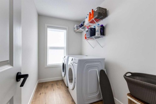 77 Walgrove Gardens Se, Calgary, AB - Indoor Photo Showing Laundry Room