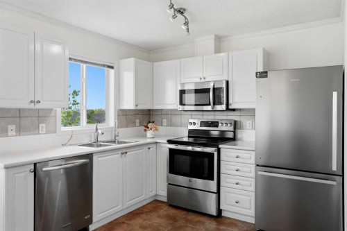 249 Citadel Point Nw, Calgary, AB - Indoor Photo Showing Kitchen With Stainless Steel Kitchen With Double Sink