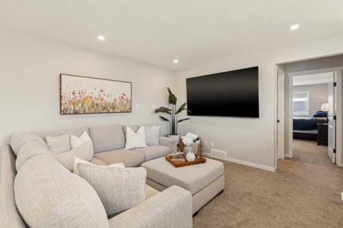 437 Magnolia Way Se, Calgary, AB - Indoor Photo Showing Living Room