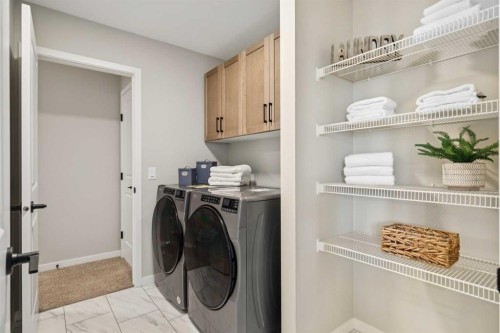 437 Magnolia Way Se, Calgary, AB - Indoor Photo Showing Laundry Room