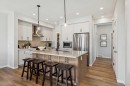 437 Magnolia Way Se, Calgary, AB  - Indoor Photo Showing Kitchen With Stainless Steel Kitchen With Upgraded Kitchen 