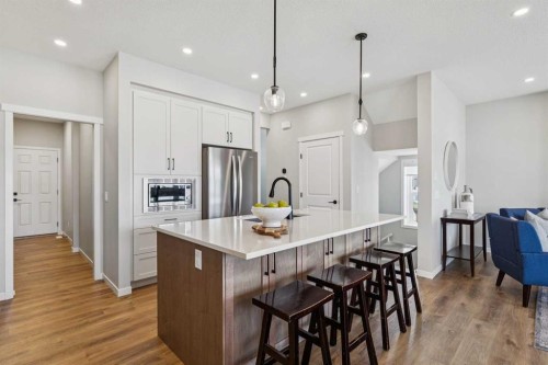 437 Magnolia Way Se, Calgary, AB - Indoor Photo Showing Kitchen With Stainless Steel Kitchen With Upgraded Kitchen
