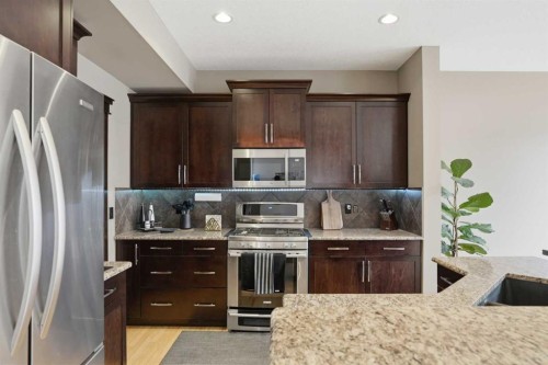 44 Westridge Crescent, Okotoks, AB - Indoor Photo Showing Kitchen With Stainless Steel Kitchen