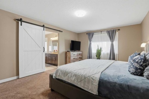 44 Westridge Crescent, Okotoks, AB - Indoor Photo Showing Bedroom