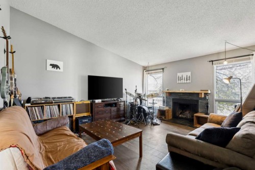 68 Templegreen Bay Ne, Calgary, AB - Indoor Photo Showing Living Room With Fireplace