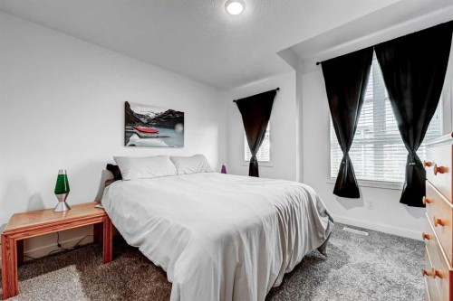 105 Walden Common Se, Calgary, AB - Indoor Photo Showing Bedroom