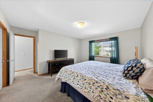 152 Chapman Close Se, Calgary, AB - Indoor Photo Showing Bedroom