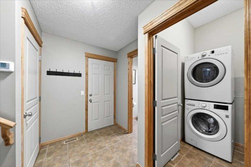 152 Chapman Close Se, Calgary, AB - Indoor Photo Showing Laundry Room