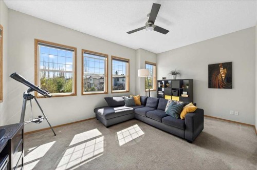 152 Chapman Close Se, Calgary, AB - Indoor Photo Showing Living Room