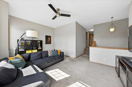 152 Chapman Close Se, Calgary, AB - Indoor Photo Showing Living Room