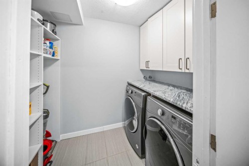 4-1205 Cameron Avenue Sw, Calgary, AB - Indoor Photo Showing Laundry Room
