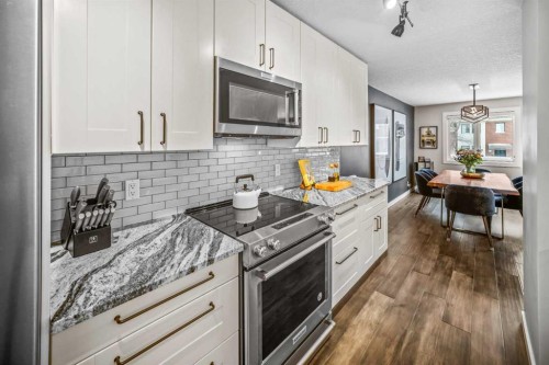 4-1205 Cameron Avenue Sw, Calgary, AB - Indoor Photo Showing Kitchen With Upgraded Kitchen