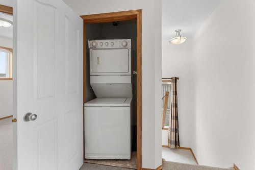 108 Everstone Rise Sw, Calgary, AB - Indoor Photo Showing Laundry Room