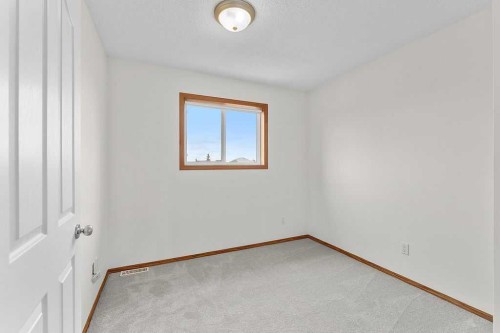 108 Everstone Rise Sw, Calgary, AB - Indoor Photo Showing Other Room