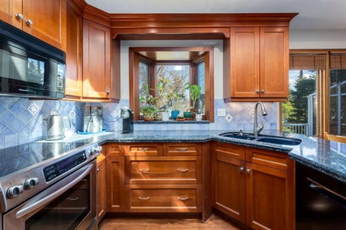 2724 Palliser Drive Sw, Calgary, AB - Indoor Photo Showing Kitchen With Double Sink