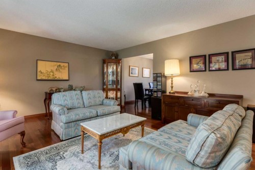 2724 Palliser Drive Sw, Calgary, AB - Indoor Photo Showing Living Room
