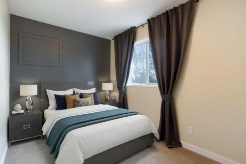 2420 Riverstone Road Se, Calgary, AB - Indoor Photo Showing Bedroom