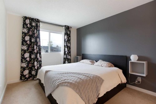 2420 Riverstone Road Se, Calgary, AB - Indoor Photo Showing Bedroom