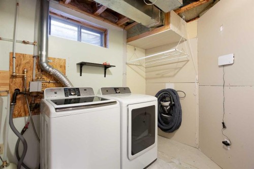 2420 Riverstone Road Se, Calgary, AB - Indoor Photo Showing Laundry Room