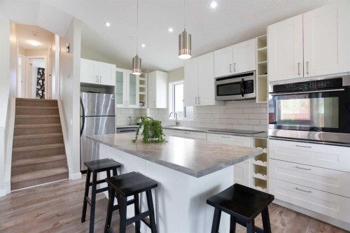 2420 Riverstone Road Se, Calgary, AB - Indoor Photo Showing Kitchen With Upgraded Kitchen