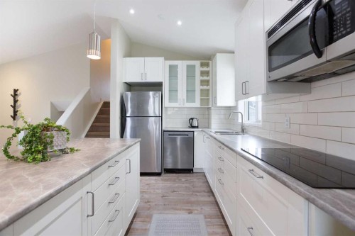 2420 Riverstone Road Se, Calgary, AB - Indoor Photo Showing Kitchen With Stainless Steel Kitchen With Upgraded Kitchen