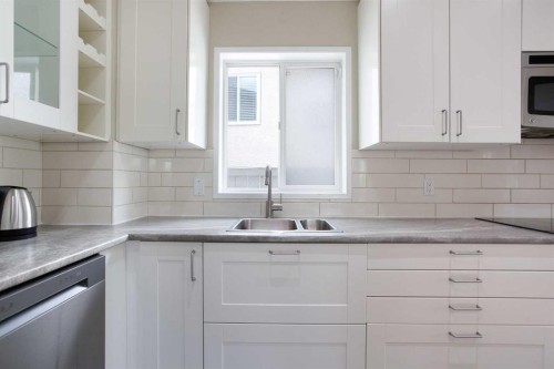 2420 Riverstone Road Se, Calgary, AB - Indoor Photo Showing Kitchen With Double Sink