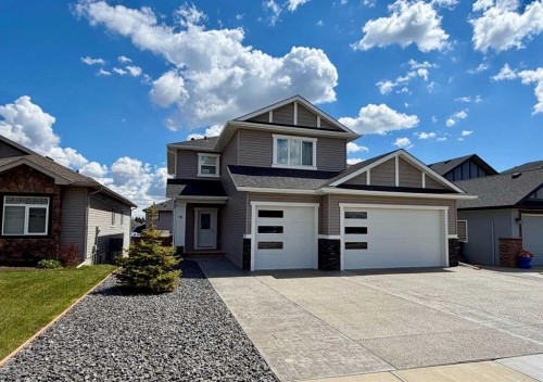78 Lakes Estates Circle, Strathmore, AB - Outdoor With Facade