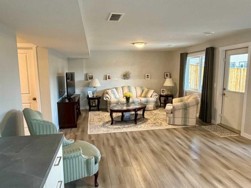 78 Lakes Estates Circle, Strathmore, AB - Indoor Photo Showing Living Room