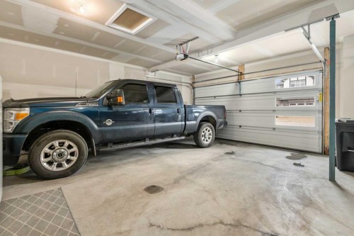 78 Lakes Estates Circle, Strathmore, AB - Indoor Photo Showing Garage