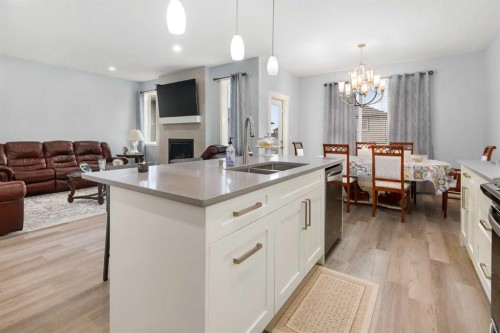 78 Lakes Estates Circle, Strathmore, AB - Indoor With Fireplace