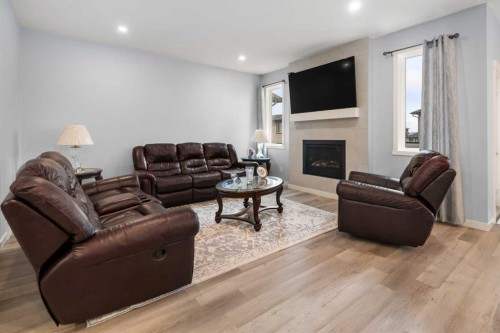 78 Lakes Estates Circle, Strathmore, AB - Indoor Photo Showing Living Room With Fireplace