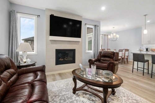 78 Lakes Estates Circle, Strathmore, AB - Indoor Photo Showing Living Room With Fireplace