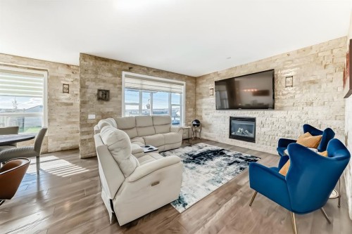 89 Evansdale Landing Nw, Calgary, AB - Indoor Photo Showing Living Room With Fireplace