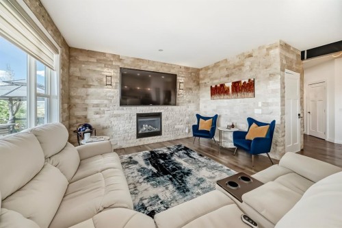 89 Evansdale Landing Nw, Calgary, AB - Indoor Photo Showing Living Room With Fireplace